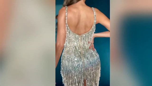 Nora Fatehi Is Seen In A Bold Style In A Silver Colored Backless Fringe Dress.