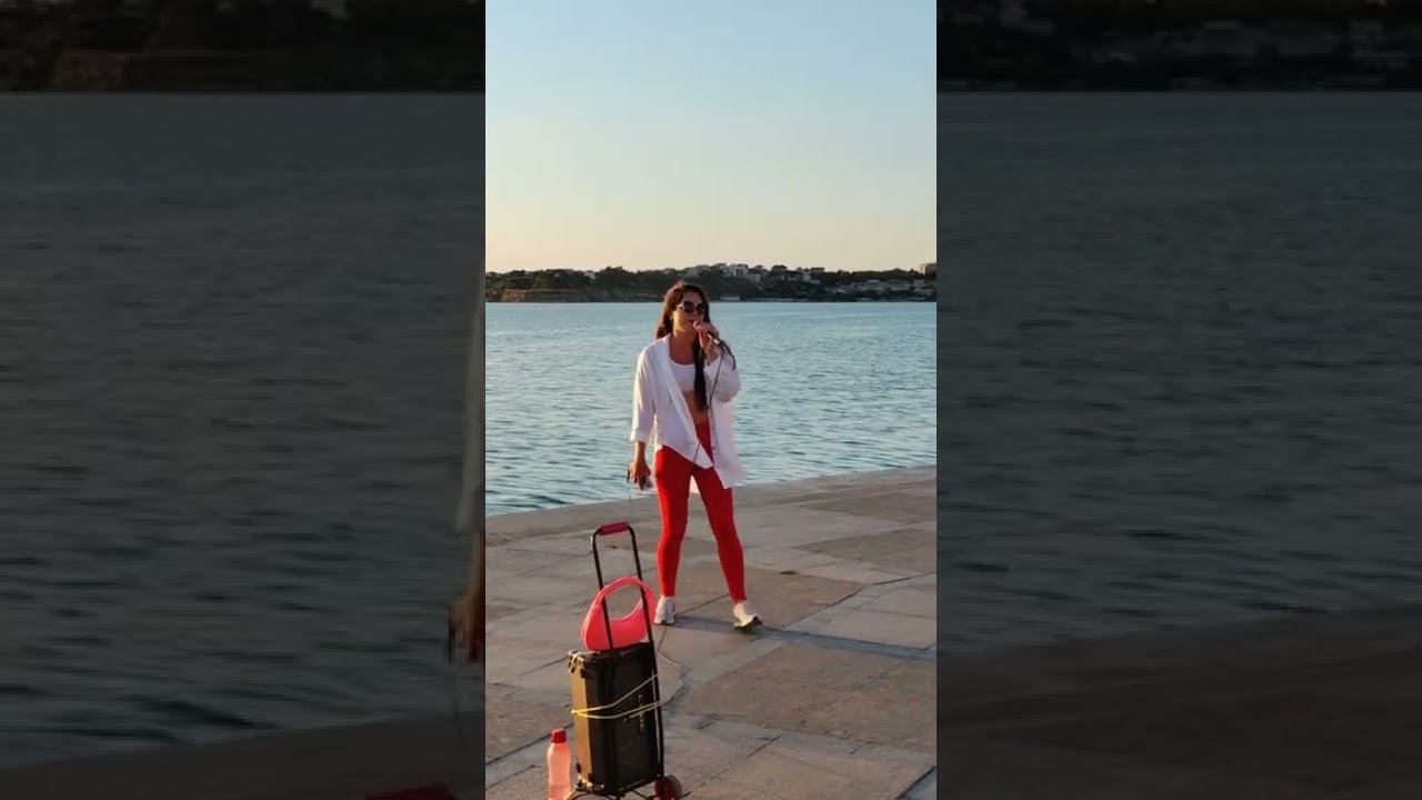 Julia Milows - Underneath your clothes (Shakira cover) + tango dancers on the sea embankment смотреть онлайн
