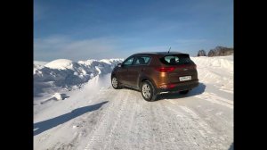 Система помощи при спуске с горы на KIA SPORTAGE4