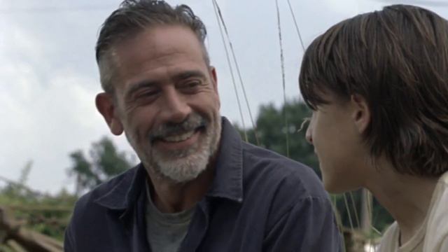 Ниган разговаривает с мальчиком