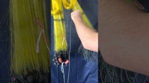 Посадка рыболовной сети на леску