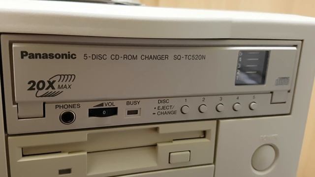 Panasonic 5 CD ROM changer SQ-TC520N смотреть онлайн