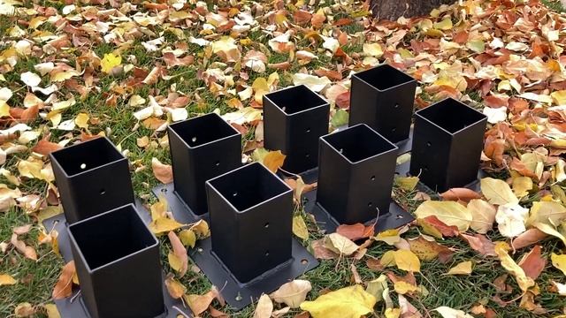 Обзор стаканов для установки деревянных столбов на бетонную площадку