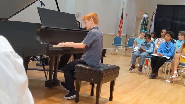 Dylan (10 years old) piano recital - BAD arranged by Peter Bence смотреть онлайн
