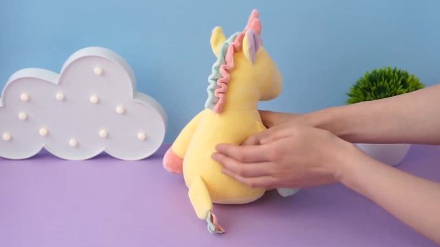 Мягкая игрушка "Единорог" с сердцем 35см, желтый смотреть онлайн