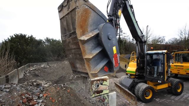 Bagger VOLVO EW 160 D mit VTN Brecherlöffel смотреть онлайн