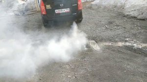 мазда премаси дымит