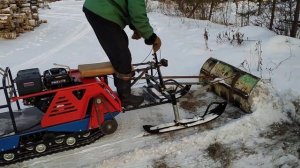 Самодельная лопата на мотобуксировщике с лыжным модулем.