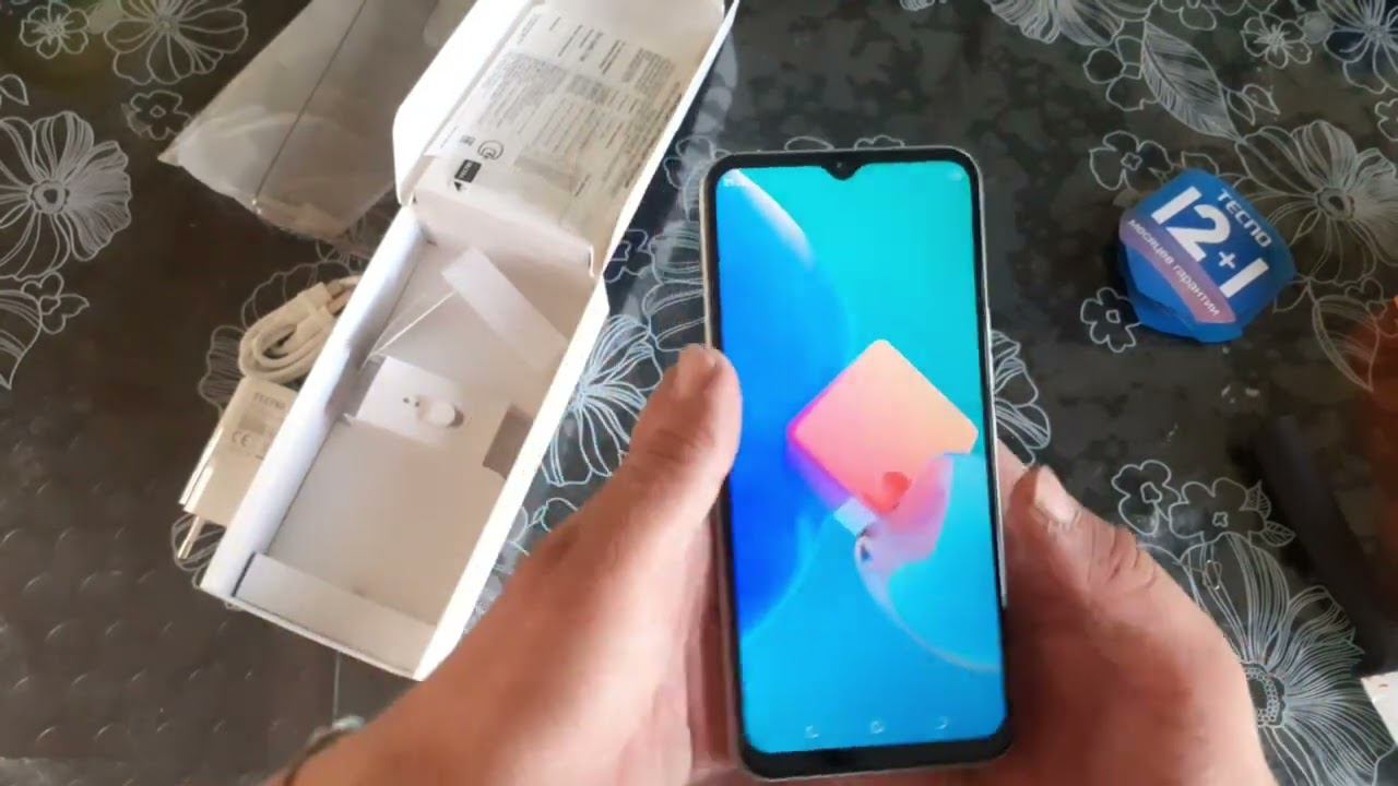 Распаковка и обзор телефона Tecno Spark 8c смотреть онлайн