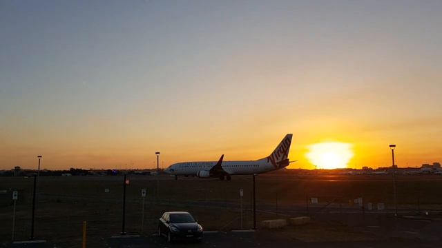 Красивые кадры на фоне Заката в Сиднейском Аэропорту смотреть онлайн