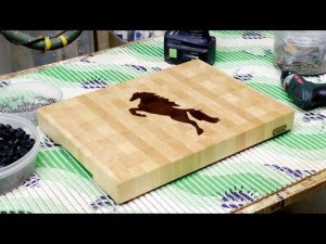 A "Horse" inlaid end grain cutting board