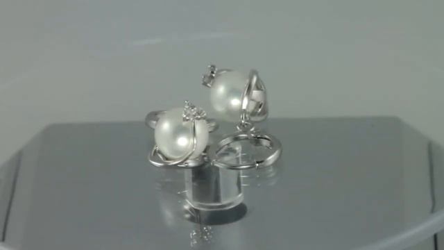 Серьги с жемчугом, покрытые слоем настоящей платины смотреть онлайн