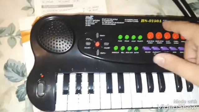 HS-3250 32 KEYBOARD ELECTRIC PIANO UNBOXING AND REVIEW смотреть онлайн