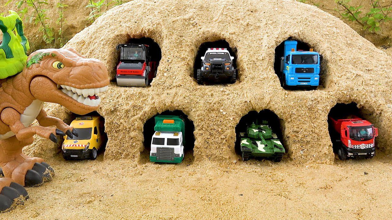 Строительные машины играют с игрушечными динозаврами | Строительная машина в пещере смотреть онлайн