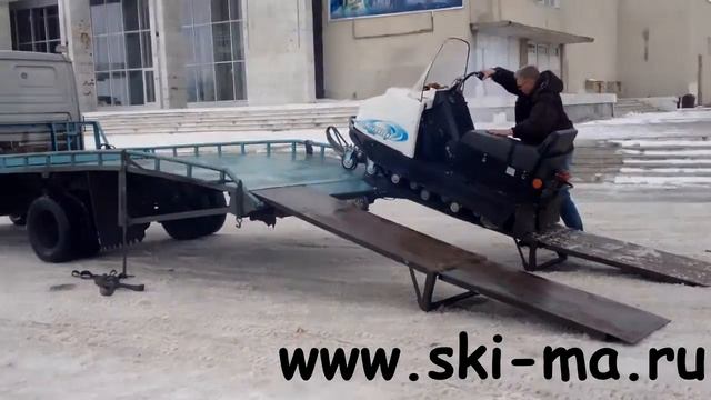 Загрузка снегохода "Буран" на эвакуатор при помощи транспортировочных колёс смотреть онлайн