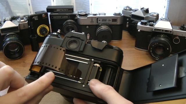 Как вставить и достать плёнку из фотоаппората Зенит ЕТ смотреть онлайн