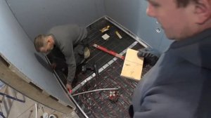 стяжка с уклоном к трапу