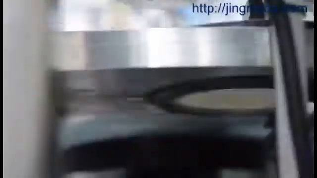 Видео работы машины для производства бумажных крышек для супниц и стаканчиков JMD-60Z