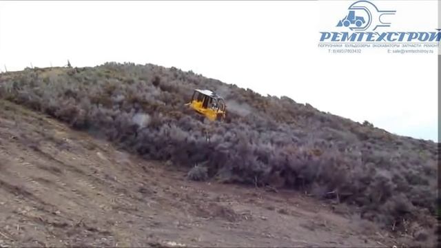 Бульдозер Dressta TD15 M EXTRA расчистка склона смотреть онлайн