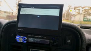Обзор китайской 1-din магнитолы Podofo на Android с выдвижным экраном.