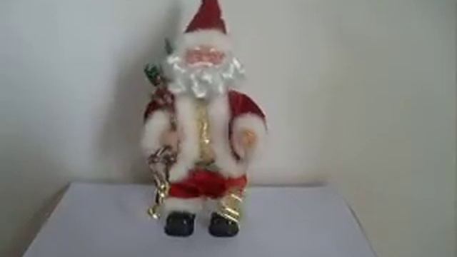 76903 Игрушка механическая музыкальная Санта Клаус смотреть онлайн