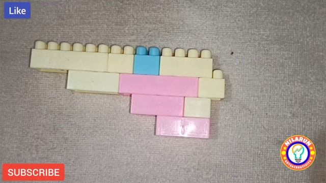 Making rubber band building blocks gun || How to make a building blocks gun that shoots rubber band смотреть онлайн