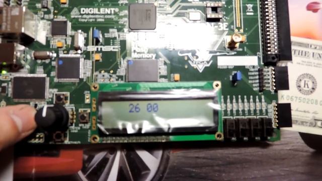 часы на XILINX SPARTAN-3E, ПЛИС смотреть онлайн