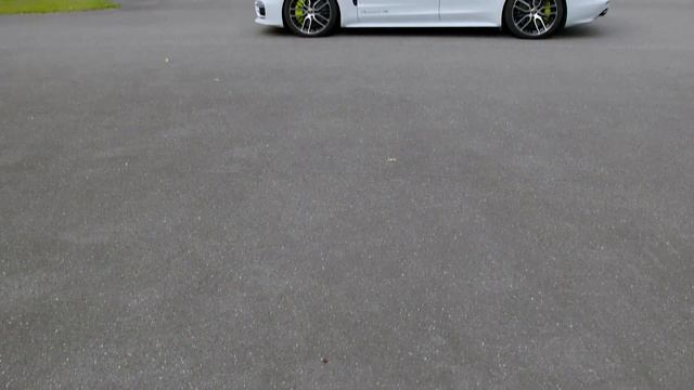 Porsche Panamera E Hybrid Sport Turismo Exterior Interior in Carrara White Metallic смотреть онлайн