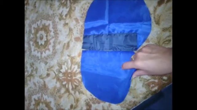 Карман с одной листочкой на синтипоновой жилетке из плащевки. смотреть онлайн