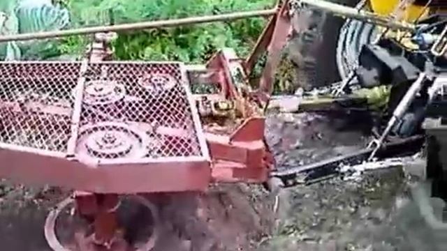 Jinma 244 и роторный плуг.