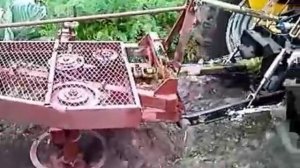 Jinma 244 и роторный плуг.