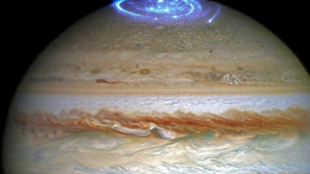 How a Magnetic 'Tug-of-War' With Io's Volcanic Eruptions Creates Jupiter's Auroras смотреть онлайн