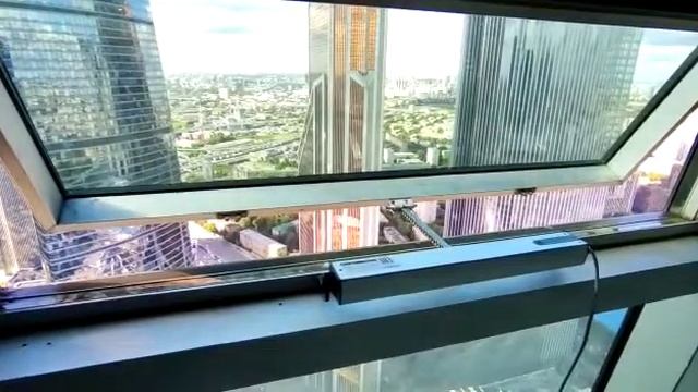 Монтаж цепных приводов WI-MATIC в башнях Москва Сити. Проветривание Moscow Sity