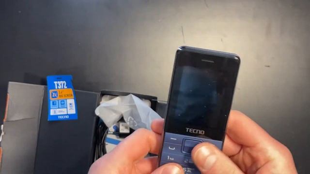 Распаковка мобильный телефон Tecno T372 Triple SIM смотреть онлайн