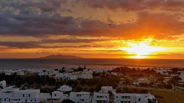 Aegean sunrise at Kamari Santorini island смотреть онлайн