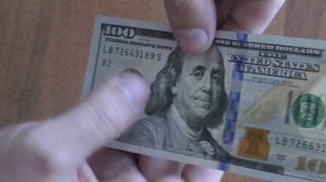 Как настоящие доллары отличить от фальшивых