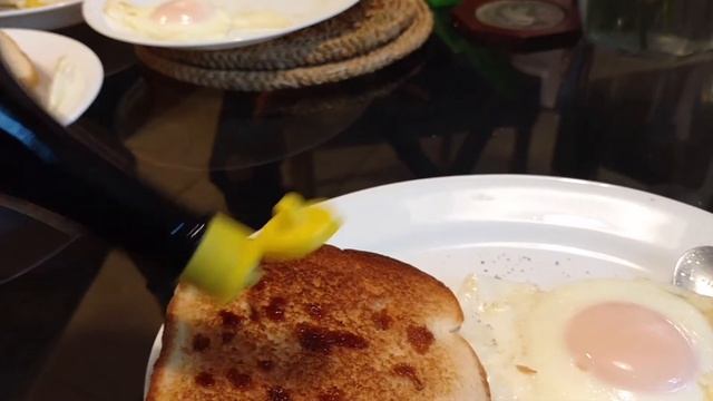 Breakfast Eggs, Toast, And Maggi Seasoning Sauce