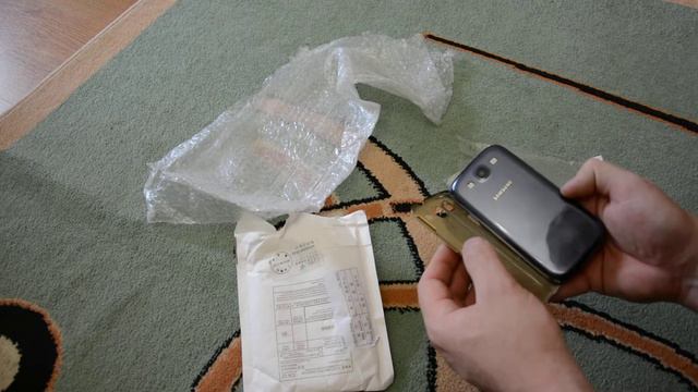 Посылка с Aliexpress №119 - Золотая перфорированная накладка Galaxy S3 смотреть онлайн