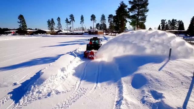 Трактор с роторным снегоуборщиком видео работы смотреть онлайн
