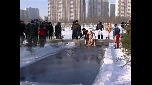 Russian Girls Snow Bathing & Ice Swimming In Winter. Epiphany. Church Promoted Ice Water Swim