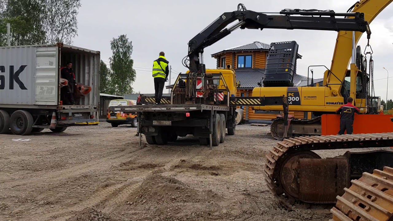 Выгружаем комплектующие экскаваторов для компании БигМашинари.Мощный манипулятор.timelapse смотреть онлайн