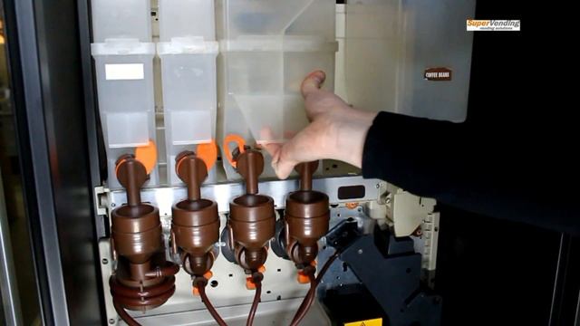 Видеоинструкция к Saeco Cristallo 400. Бункеры для сыпучих ингредиентов и сахара: снятие/установка смотреть онлайн