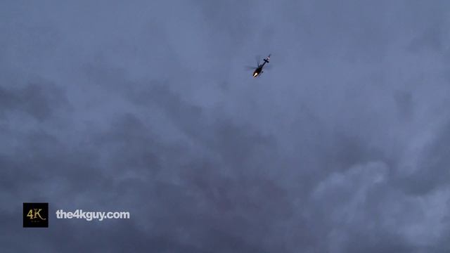 4K - Police helicopter flying above the viewer смотреть онлайн