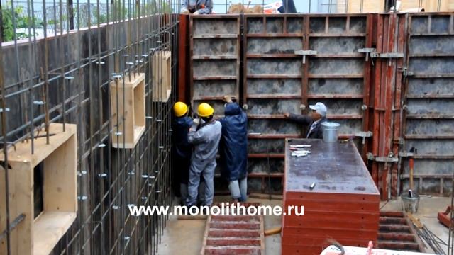 Строительство монолитного дома с цокольным этажом и плоской крышей компания Монолит-домстрой