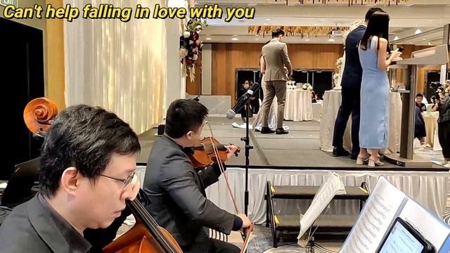 Singapore musicians (violinist and cellist) perform for a wedding march-in смотреть онлайн
