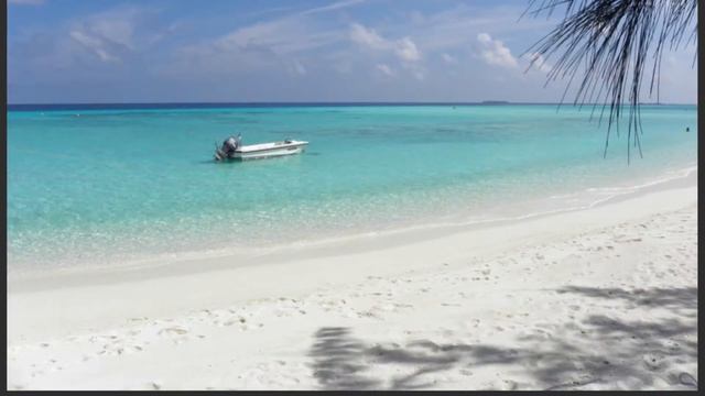 SUMMER ISLAND MALDIVES , NORTH MALE ATOLL . ACCOMMODATION & BEACHES
