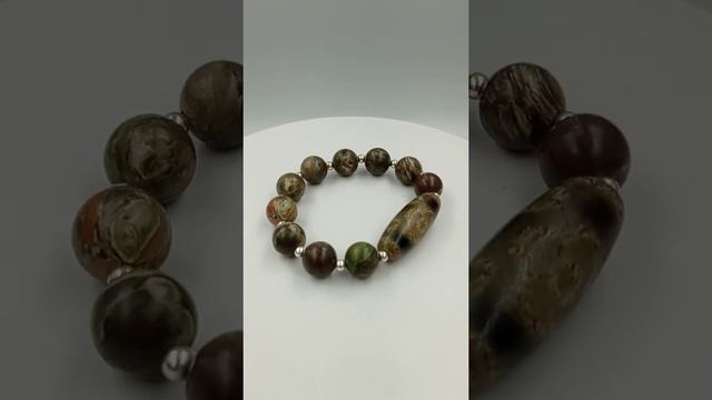 Цветок лотоса - 6 Глаз бусина Дзи (браслет яшма-серебро) смотреть онлайн