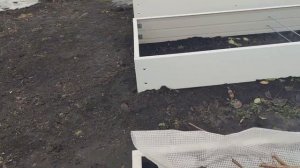 Грядки из подоконников ПВХ, перезимовавшие под открытым небом на огороде, спустя год.