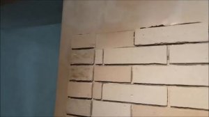 Проще простого! Клеим декоративный кирпич или декоративный камень.