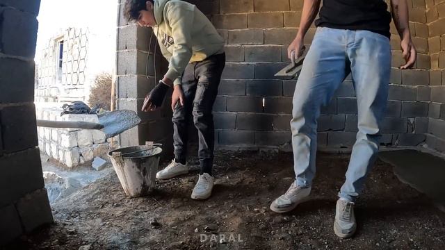 Amir And His Family Are Pouring Concrete On The Floor Of Their New Room